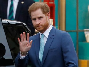 In this file photo taken on March 9, 2020, Britain's Prince Harry, Duke of Sussex leaves after attending the annual Commonwealth Service at Westminster Abbey in London.