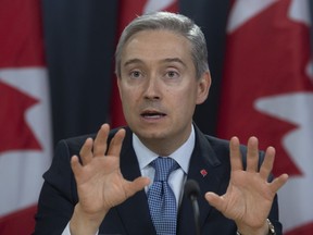 Foreign Affairs Minister Francois-Philippe Champagne responds to a question during a news conference in Ottawa, Monday, March 9, 2020.