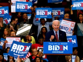 In this file photo taken on March 09, 2020 Democratic presidential candidate former Vice President Joe Biden gestures as he speaks during a campaign rally at Renaissance High School in Detroit, Michigan.