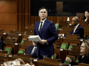 Finance Minister Bill Morneau speaks in the House of Commons as legislators convene to pass a COVID-19 financial aid package, in Ottawa on March 25, 2020.