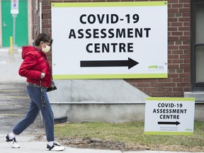 A woman arrives at the Covid-19 assessment centre at the Michael Garron Hospital in Toronto on Tuesday, March 24, 2020.