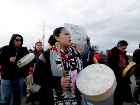 Supporters of the indigenous Wet'suwet'en Nation's hereditary chiefs block the Pat Bay highway as part of protests against the Coastal GasLink pipeline, in Victoria, British Columbia, Canada February 26, 2020.