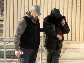 Claude Eric Trachy arrives at the Chatham courthouse on Monday February 3, 2020 with an unidentified man for a sentencing hearing regarding the former music teacher's conviction on historical sexual assault offences involving former students.