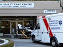 Paramedics leave the Lynn Valley Care Centre, a seniors care home that housed a man who was the first in Canada to die after contracting novel coronavirus, in North Vancouver on March 9, 2020.