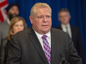 Ontario Premier Doug Ford answers questions at Queen's Park in Toronto on Friday, March 27, 2020.