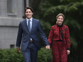 Prime Minister Justin Trudeau and Sophie Gregoire Trudeau arrive at Rideau Hall in Ottawa, Wednesday, Sept.11, 2019. Trudeau and his wife are in self-isolation over COVID-19 concerns, which has forced the cancellation of an in-person meeting of Canada's first ministers.