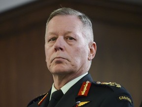 Chief of Defence Staff Jonathan Vance attends a bilateral meeting between Prime Minister Justin Trudeau and Latvian President Egils Levits in London on Tuesday, Dec. 3, 2019. Canada's top general says he is concerned about anything that would give China easier access to the Canadian military's computer networks.
