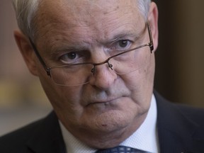 Minister of Transport Marc Garneau listens to a reporter's question following an announcement in Ottawa, Thursday, Feb. 27, 2020. Canada is spearheading what Garneau hopes will become an international effort to protect civilian airliners around the world from being shot down over conflict zones.