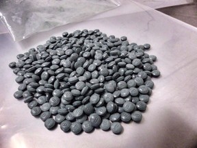 Fentanyl pills are shown in an undated police handout photo. THE CANADIAN PRESS/HO - Alberta Law Enforcement Response Teams