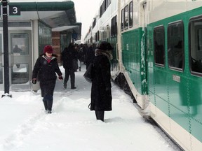 Commuters get set to board a GO train in Oakville, Ont., Monday, Feb.2, 2015. Some Canadian transit agencies are quietly taking steps to protect customers against the novel coronavirus that's been sounding alarm bells around the world.