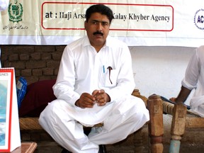 This photograph taken on July 22, 2010, shows Pakistani surgeon Shakeel Afridi, who was working for CIA to help find Osama bin Laden, attending a Malaria control campaign in Khyber tribal district.