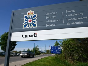 A sign for the Canadian Security Intelligence Service building is shown in Ottawa, Tuesday, May 14, 2013. Newly released documents show Canada's spy agency is moving ahead with plans to collect and use databases containing personal information about Canadians.