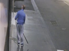 The man fed the fishing rod through the window after scanning the street at 2 a.m.