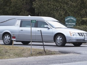 A hearse leaves with another casualty of COVID-19 at Pinecrest Nursing Home in Bobcaygeon, Ontario on Tuesday March 31, 2020. The Haliburton, Kawartha, Pine Ridge District Health Unit has said the outbreak at Pinecrest Nursing Home in Bobcaygeon is believed to be the largest in the province.THE CANADIAN PRESS/Fred Thornhill