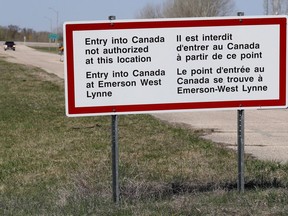 Refugee advocates say Canada could be in legal hot water if the United States deports asylum seekers turned away from Canada as part of a broader deal with the U.S. to close the border to all but non-essential traffic. A sign is seen near the border near Emerson, Man., Friday, May 5, 2017.