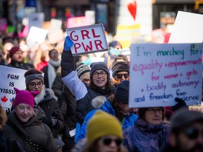The 4th Annual Ottawa Women's March makes its way from Parliament Hill to Ottawa City Hall on March 7, 2020.