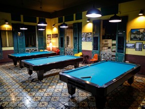 Empty pool tables are pictured at La Dalia pool saloon and restaurant after El Salvador's President ordered all bars and nightclubs to be closed and gatherings restricted to no more than 75 people for 14 days throughout the country as the government undertakes steadily stricter measures to prevent a possible spread of the coronavirus disease, in San Salvador, El Salvador March 14, 2020.