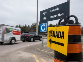 Recreational vehicles and cars of "snowbirds", a term for people who leave Canada before the snow falls and return in the spring, and other Canadians return after it was announced that the border would close to "non-essential traffic"  to combat the spread of novel coronavirus disease (COVID-19) at the U.S.-Canada border crossing at the Thousand Islands Bridge in Lansdowne, Ontario, Canada March 19, 2020.