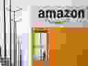 The logo of Amazon is seen at the company logistics center in Lauwin-Planque, northern France, March 19, 2020.