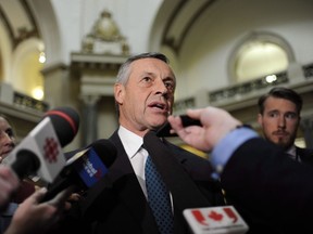 Saskatchewan's deputy premier Don Morgan speaks to reporters following the speech from the throne at the Legislative Building in Regina on October 25, 2017. Saskatchewan is temporarily suspending eviction hearings over COVID-19. The government announced starting immediately the Office of Residential Tenancies will not accept applications for missed or late rent. It says the office will only hold eviction hearings for the most urgent matters where health or safety is at risk. Minister of Labour Relations and Workplace Safety Don Morgan says tenants should be able to stay at home as per public health advice without fear of eviction.