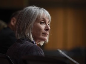 Minister of Health Patty Hajdu listens during a press conference on COVID-19 in West Block on Parliament Hill in Ottawa, on Friday, March 20, 2020.