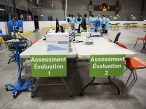 An assessment station is seen on the rink floor at Brewer Park Arena as medical staff prepare for the opening of the COVID-19 Assessment Centre in Ottawa, during a media tour on Friday, March 13, 2020. The assessment centre, operated by The Ottawa Hospital and CHEO, is an out-of-hospital clinic where people can be assessed and tested for COVID-19 if required.