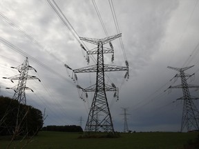 Hydro One electricity transmission lines are seen south of Chesley, Ont., on Sunday, Sept. 29, 2019. It's as if the COVID-19 epidemic had tripped a circuit breaker, shutting off all power to a city the size of Ottawa.