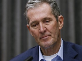 Manitoba Premier Brian Pallister listens to a reporterÕs question during a COVID-19 press conference at the Manitoba legislature in Winnipeg Friday, March 27, 2020.