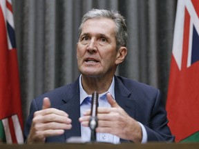 Manitoba Premier Brian Pallister speaks and answers questions during a COVID-19 press conference at the Manitoba legislature in Winnipeg, Thursday, March 26, 2020.