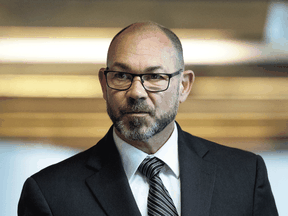 Col. Mario Dutil returns to the courtroom after a break during his court martial in Gatineau, Que., June 10, 2019.