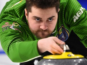 Team Saskatchewan skip Matt Dunstone delivers as they take on Team BC at the Brier in Kingston, Ont., on March 2, 2020.