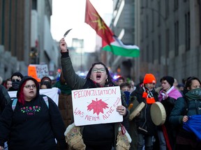Supporters of Wet'suwet'en hereditary chiefs march protest in Montreal on Feb. 25, 2020.