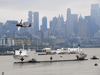 The USNS Comfort medical ship moves up the Hudson River as it arrives on March 30, 2020 in New York as seen from Weehawken, New Jersey.