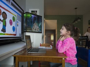 Six-year-old Peyton Denette works on her speech and language skills with speech-language pathologist Olivia Chiu of Two Can Talk remotely from her home in Mississauga, Ont., on Monday, March 30, 2020. Denette along with many other children are having to adapt to online learning due to the coronavirus also known as COVID-19.