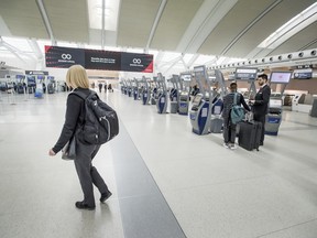 A near empty United States check-in area at Toronto Pearson Airport’s Terminal 1 during concerns the Covid 19 virus, Friday March 13, 2020.