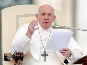 Pope Francis gestures as he speaks during the weekly general audience at Vatican, Feb. 26, 2020.