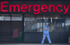 A health care worker outside the Emergency department of the Vancouver General Hospital, March 30, 2020.