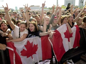 Fans attend a War Child Canada benefit concert held at the Forks in Winnipeg on Saturday Sept.16, 2000. Canada's charities say the layoffs have started and services, which are usually in high demand during economic downturns, are being shut down as the sector feels the financial sting from COVID-19.