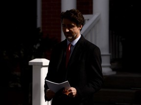 Prime Minister Justin Trudeau arrives to address Canadians on the COVID-19 situation from Rideau Cottage in Ottawa on Wednesday, March 25, 2020.