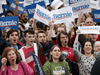 Bernie Sanders supporters cheer as primary election results are shown on television during a Super Tuesday rally on March 03, 2020 in Essex Junction, Vermont.