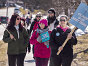 Ontario English Catholic Teachers Association members picket in Brantford as part of a province-wide one-day strike on March 5, 2020.