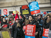 Ontario teachers and education workers picket outside of The Fairmont Royal York Hotel in Toronto on Feb. 12, 2020.
