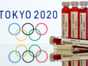 Forty years on, the upcoming Tokyo Games are the "cursed Olympics" once again, Japan's finance minister said, as the government grapples with planning the year's biggest sporting event in the middle of a pandemic.