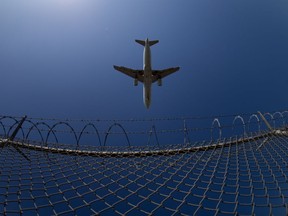 An flight from Mexico City arrives at Vancouver International Airport, in Richmond, B.C., on Friday, March 20, 2020. Police in western Newfoundland say a woman who was arrested for refusing to stay at home after she returned from a trip outside the province is expected to make a court appearance today.THE CANADIAN PRESS/Darryl Dyck