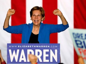 In this file photo Democratic presidential hopeful Massachusetts Senator Elizabeth Warren gestures as she speaks during a campaign rally at Eastern Market in Detroit, Michigan, on March 3, 2020.