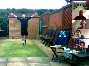 James Campbell completes his marathon in his small back yard.