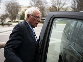 Senator Bernie Sanders, an Independent from Vermont and 2020 presidential candidate, gets into his vehicle after exiting the U.S. Capitol  in Washington, D.C., U.S., on Wednesday, March 18, 2020.