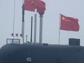 A new type 094A Jin-class nuclear submarine Long March 10 of the Chinese People's Liberation Army (PLA) Navy participates in a naval parade to commemorate the 70th anniversary of the founding of China's PLA Navy in the sea near Qingdao, in eastern China's Shandong province on April 23, 2019.