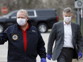 Doug Ford, Ontario's premier, wears a protective mask as he arrives at an event to hand out meals provided by Maple Leaf Sports & Entertainment (MLSE) to healthcare workers outside Centenary Hospital in Toronto, Ontario, Canada, on Friday, April 24, 2020.