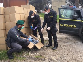 Italian police seize counterfeit masks.